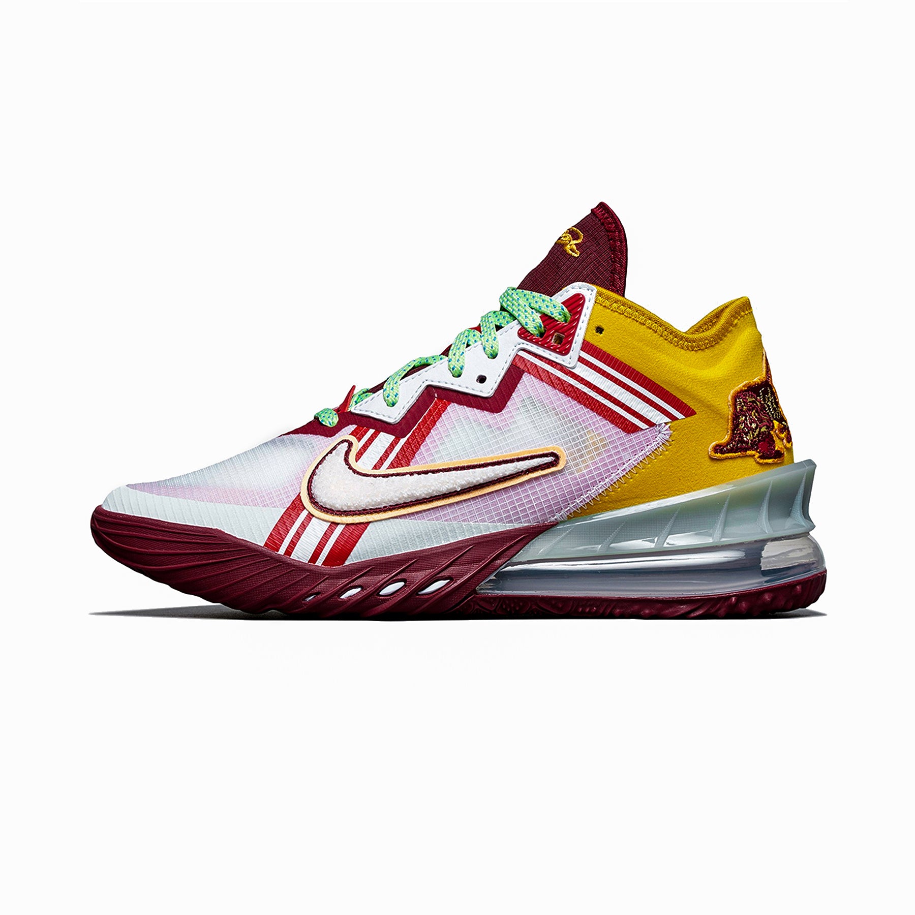 Multicolored sneaker with a prominent Nike logo in chenille on a white background
