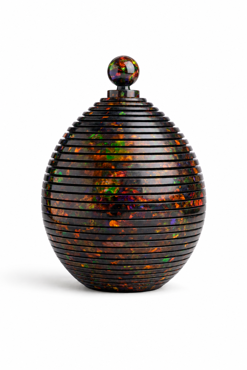 Decorative oval architectural object with multicolored pattern on a white background