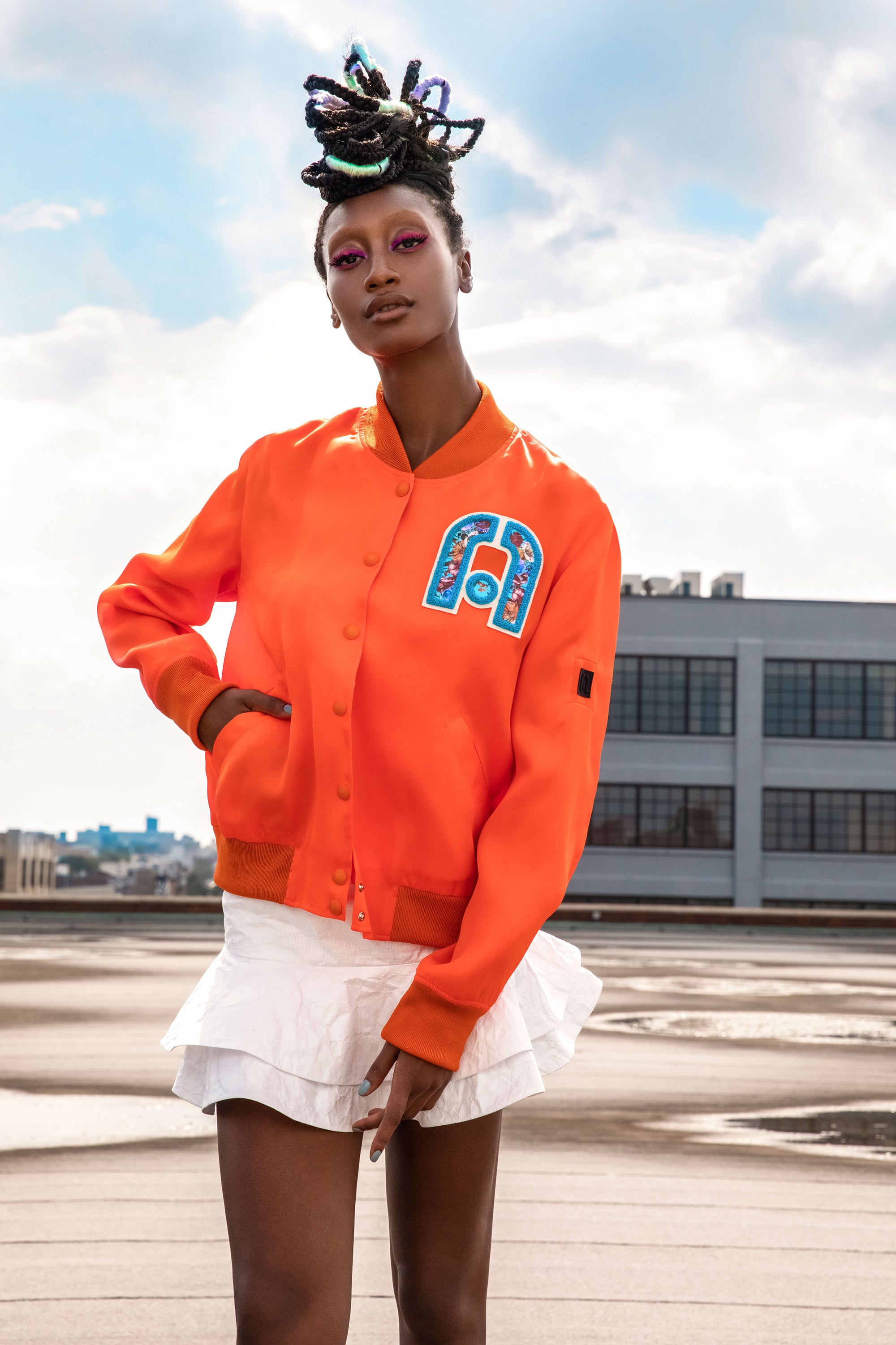 Mimi Plange Love Unfashion Collection Spring Summer Sustainable Fashion African Inspired Fashion Varsity Jacket in Bright Orange Silk  and Tyvek Skirt